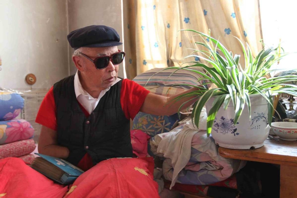 Zibo veteran conquers massive disabilities to serve at home